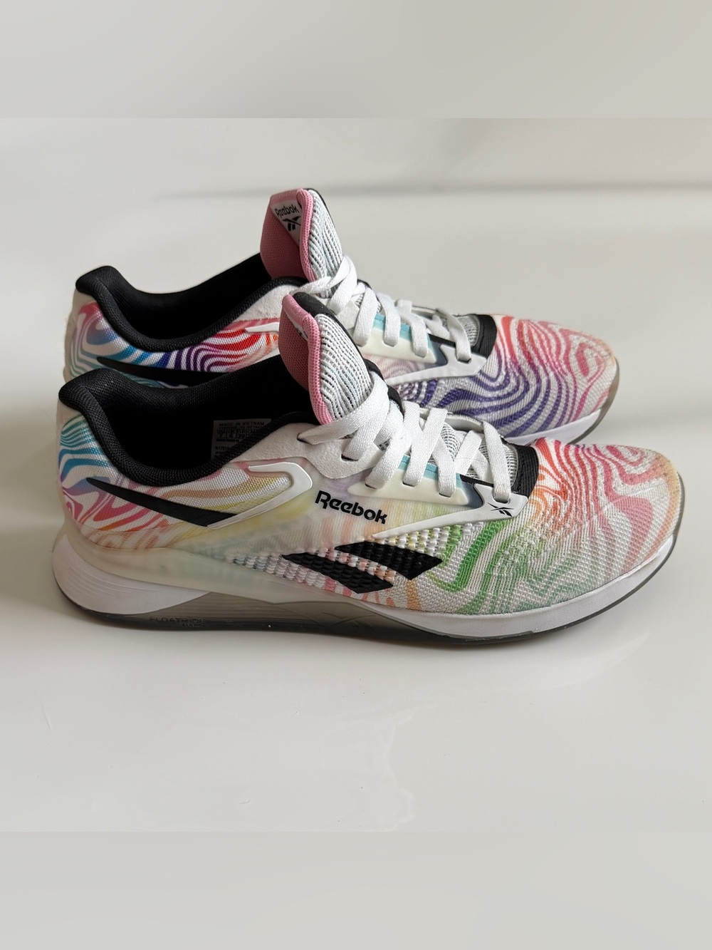 Reebok Women's White Athletic Shoes with Rainbow Wave Accents